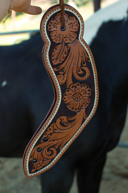 Decorative leather strap with intricate patterns 